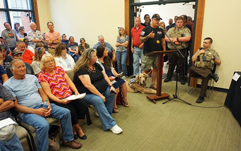 Randy Foster/editor@cherokeescout.com A standing-room-only crowd attended the Cherokee County Board of Commissioners meeting on July 17, including 15 people who signed up to talk about a proposed animal control ordinance.