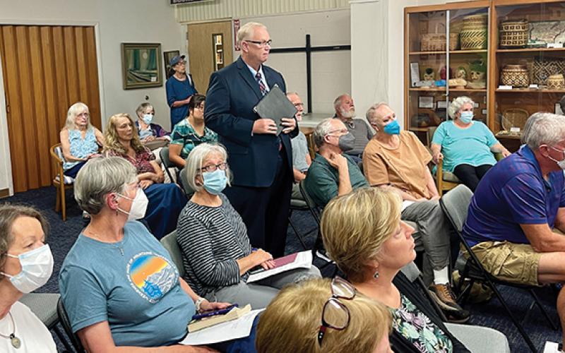 The Rev. Jimmy Tanner of First Baptist Church of Murphy speaks during a Nantahala Regional Library Board of Trustees meeting on Aug. 17, saying children already were being surgically mutilated inside the womb through abortion, and now they are outside the womb with gender reassignment surgery.