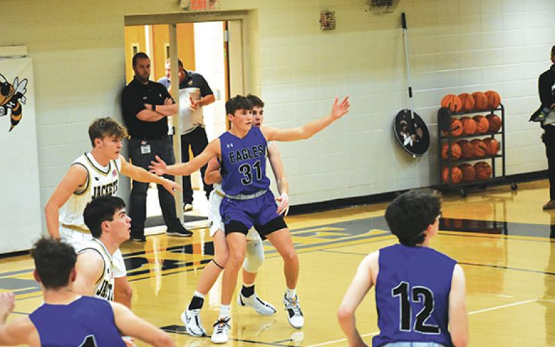 Photos by April McNabb/Contributing Photographer Jonah Hamby (31) calls for the ball during the Hiwassee Dam varsity boys basketball team’s game against Hayesville on Nov. 21, which the Eagles lost 61-55. Hiwassee Dam hosted Coppin Basin, Tenn., after the Cherokee Scout’s press time Tuesday.