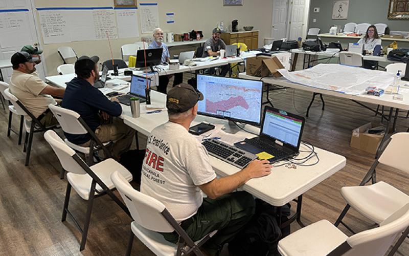 Specialists monitor fire conditions at Grace Baptist Church in Andrews, where the U.S. Forest Service and N.C. Forest Service have set up an incident command post.