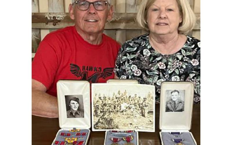 Dennis E. Murphy and Glenda Murphy Sanders show the World War II medals belonging to their father, Riley Murphy. The medals were discovered at a thrift sale and, with the support of the Union County Historical Society and the Old Unicoi Trail Chapter with Daughters of the American Revolution, they were returned to the family.