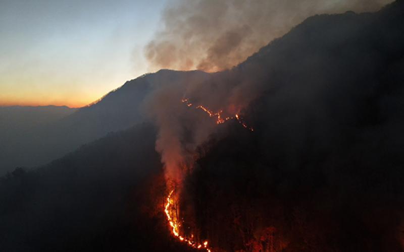 Provided by the U.S. Forest Service, shows the expanding blaze.
