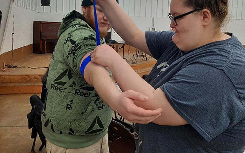 Zack Milligan and Jada Dehart of Andrews came to the Peachtree Community Center on Saturday to learn how to use a tourniquet to control bleeding in an emergency.