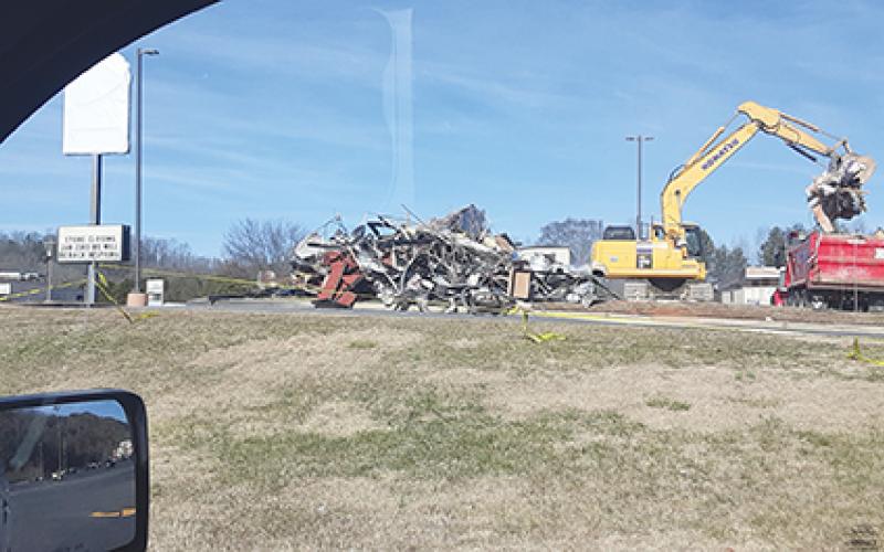 Dave Stevens/dstevens@cherokeescout.com One crunchy taco: The Taco Bell just off of U.S. 19/74 in front of the Ingles shopping center in Murphy was torn down Thursday in order to make room for a new building. The restaurant will be closed until then.