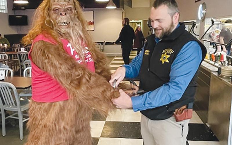 Cherokee County Sheriff Dustin Smith appeared to draw pleasure from arresting Prontees Pete (perhaps a cousin of Bigfoot?) on March 1 at Downtown Pizza in Murphy. The creature did not put up a fight and was later released once his bail had been paid.