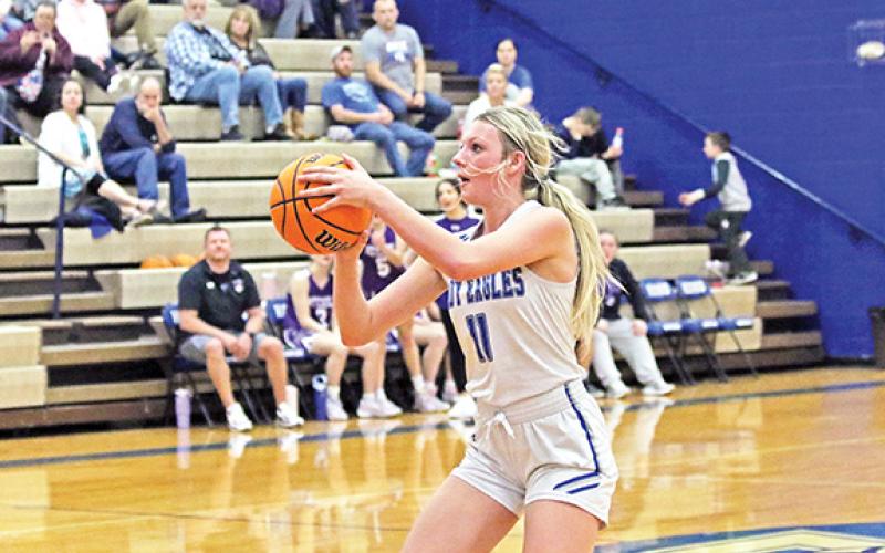 Katie McNabb takes a 3-pointer during the Lady Eagles’ game against Mitchell in the first round of the 1A state playoffs Friday.