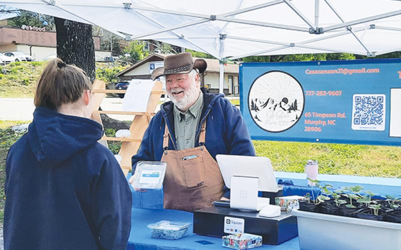 New vendor Grant Corrigan was excited about setting up for the first time at the Murphy Farmers Market on Saturday at the L&N Depot. Folks were stopping by to check out his products, which included goat milk soap and micro greens.