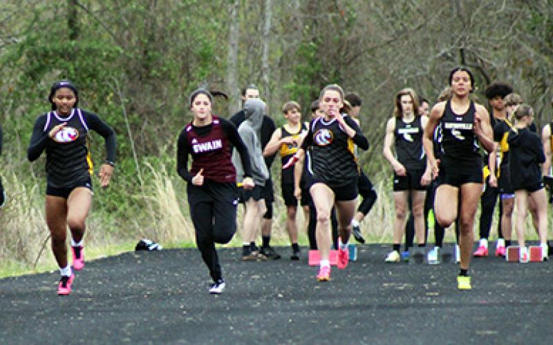 J.R. Carroll/Staff Correspondent Murphy runners (from left) Patience Garrett, Cayla Greer and Rylee Tabor competing in the 100-meter dash on April 3.