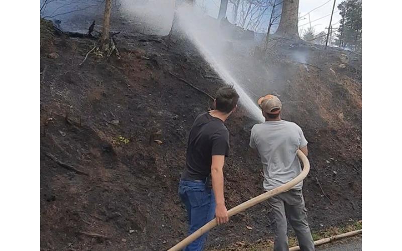 From left are Ranger firefighters Carson Taylor and Doug Belcher, who were able to help extinguish the fire in multiple areas March 22, sparing the home from further damage.