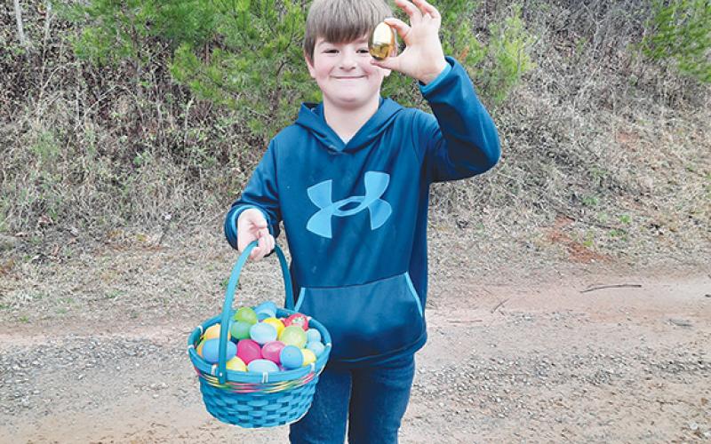 Ian Sargent’s Easter basket was filled to the brim with treat-filled eggs on March 23. The 8-year-old from Andrews volunteers once in a while, helping brush Little Bob. He said of High Lonesome Therapeutic Equestrian Center’s biggest horse, “He’s sweet, and he’s lazy, and he’s ginormous!”