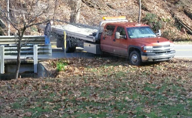 An abandoned vehicle was pulled out of a creek in Andrews Tuesday morning. (contributed photo)