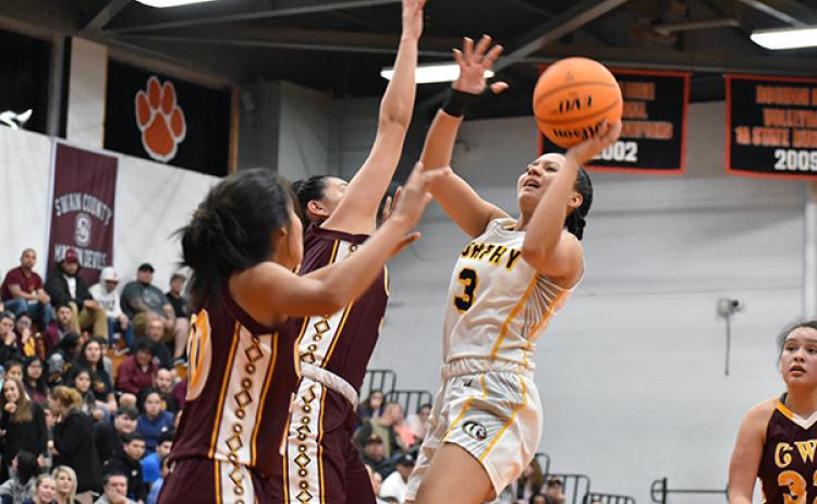 Murphy guard Kaiya Pickens attempts to float the ball over the Cherokee defense.