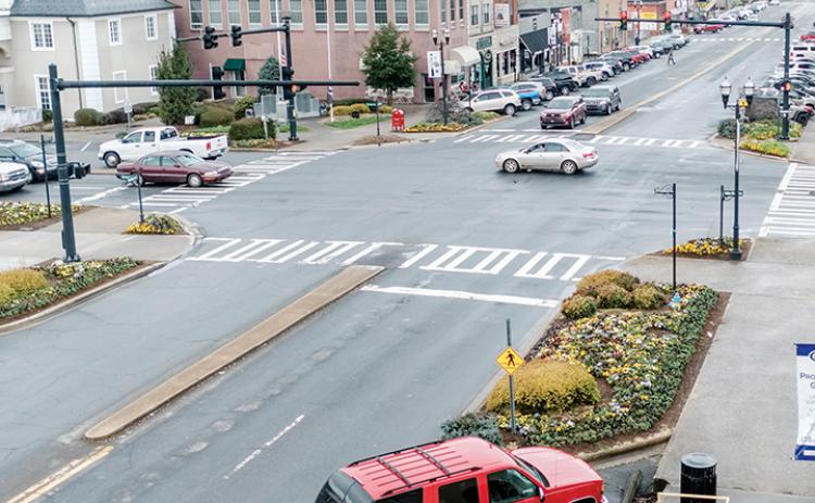 Before the state’s Stay-at-Home Order was enacted last month, downtown Murphy was filled with vehicles on a daily basis. The traffic flow is going to change. Phot by Sam Jokich