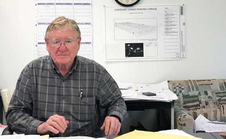 John Glenn works at his office in Topton. He said he has spent “hundreds of thousands of dollars” trying to build an adult care living facility in Peachtree. Photo by Penny Ray