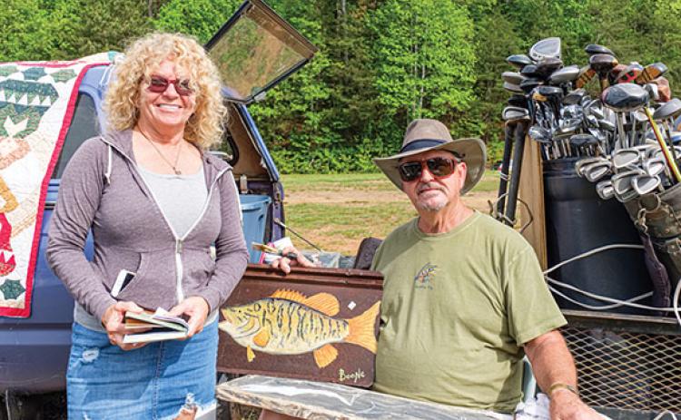 Mr. and Mrs. Danny Wilkson are artists who travel around the tri-state area, but love coming to Murphy. Photo by Sam Jokich.
