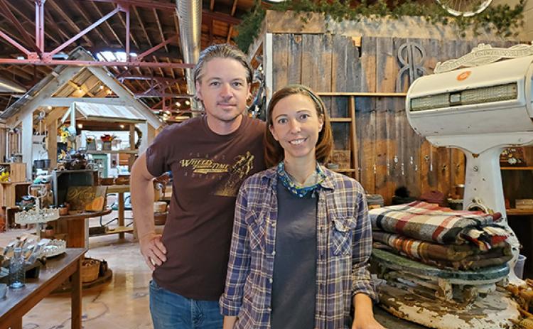 Local residents Pav and Kate Templeton are ready to welcome customers to Rare Bird Emporium on Andrews Road in Murphy. Photo by Samantha Sinclair