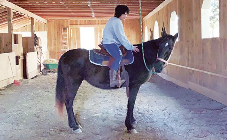 Te’Lor Allen of Texana started taking care of horses when she was about 12 years old. She has rehabilitated several of the beautiful animals since then.