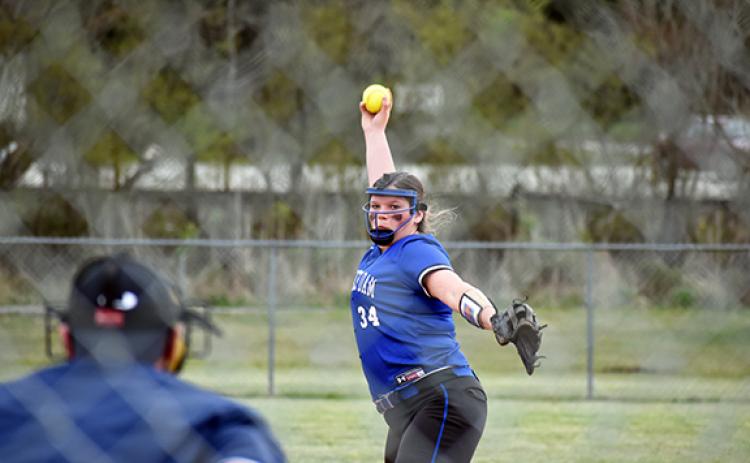 Noah Shatzer/sports@cherokeescout.com Hiwassee Dam senior Katie Gibson winds up a pitch during the Lady Eagles’ 24-5 victory over the Lady Wildcats at Valley River Park on March 23. Gibson pitched two innings, striking out three batters and allowing zero hits.