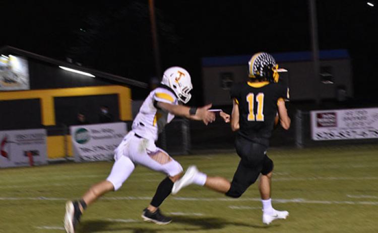 Justin Fitzgerald/sports@cherokeescout.com Murphy receiver Hunter Laney crosses the end zone just out of the reach of a Thomas Jefferson defender to put the finishing touches on a 54-yard touchdown Friday. Murphy will face Elkin in the second round this week.