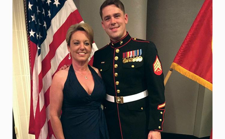 Sgt. Christopher Lockett and his mother, Lisa Kotchenreuther, attending the U.S. Marine Corps Birthday Ball.