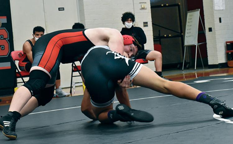 Justin Fitzgerald/sports@cherokeescout.com Andrews wrestler Sam Wood battles with Robbinsville’s Ben Wachacha in a 220-pound bout during the May 4 dual meet, which the Black Knights won 78-6.