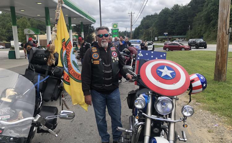 Michael Hutton, Captain America, riding his brother’s bike, who died on the trail in 2017.