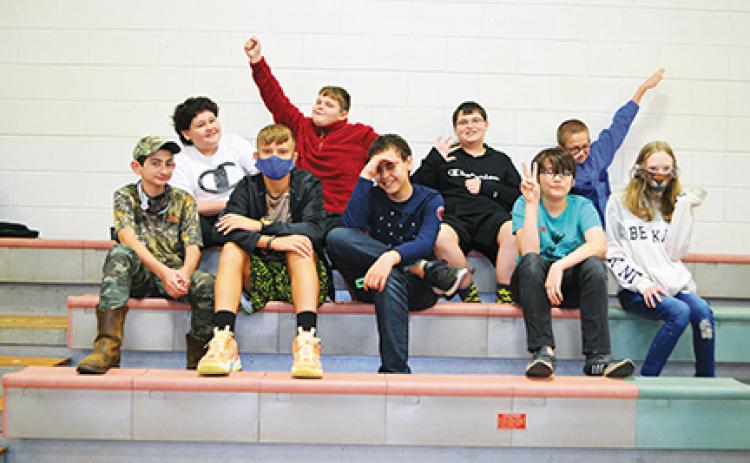 Photos by Abigail Hickman/Staff Correspondent Middle school students act silly while waiting for the Atlanta Shakespeare Company to arrive. Front row: Mason Smith, Greison Hall, Alex Ashe, Charlie Kent and Sophia Suetta. Back row: Skyler Casio, Luke Bradley, Carter Hooper and Jacob Williamsy.