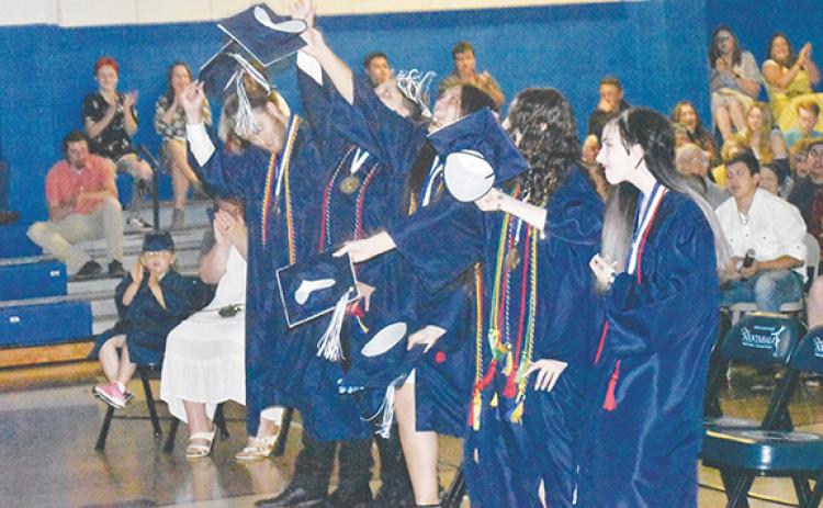 Photos by Justin Fitzgerald/sports@cherokeescout.com Nantahala High School’s Class of 2022 celebrates after receiving their diplomas Friday.