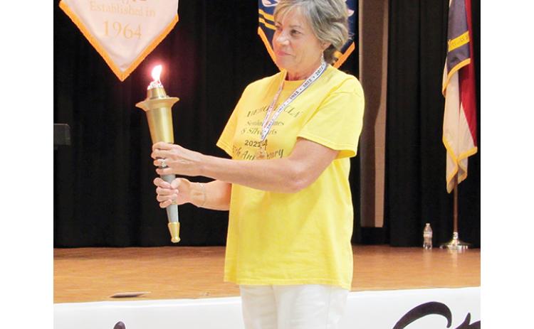 Photos by Terence Fairies/Contributing Photographer Patty Singer was this year’s torch bearer as well as the Senior Games Spirit Award winner.