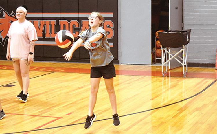 Berkley Ragon tries to keep the ball in the air during the Andrews Volleyball Camp on July 28. 