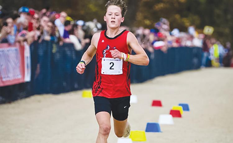 Justin Fitzgerald/sports@cherokeescout.com Tri-County Early College freshman Fern Crayton overcame a challenging fall to take fifth at last weekend’s 1A cross-country state championship.