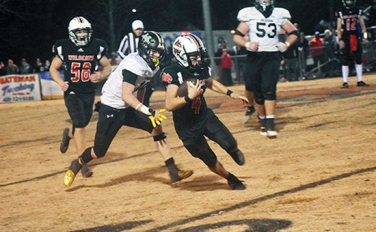 Photos by Justin Fitzgerald/sports@cherokeescout.com Andrews’ Eli Aguilar looks for running room during the Wildcats’ 42-21 loss to Draughn in the fourth round of the state 1A playoffs Friday night.