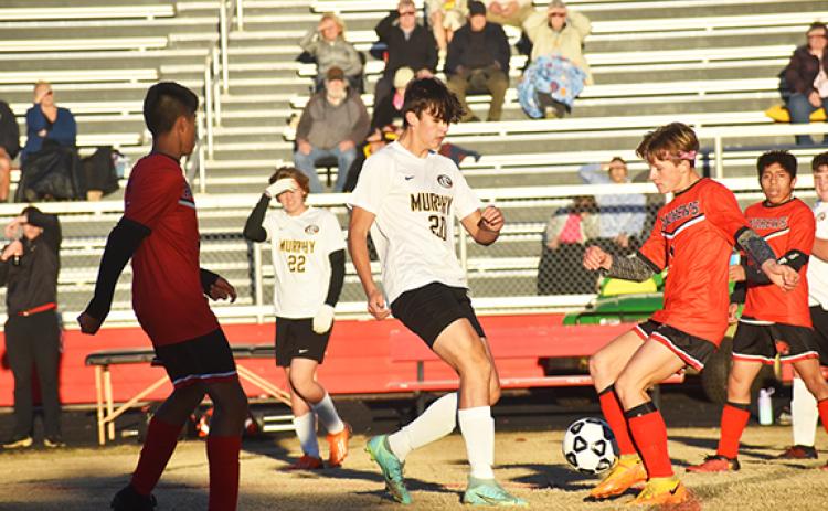 Justin Fitzgerald/sports@cherokeescout.com Murphy’s Joey Gibby and Andrews O’Malley Salinas battle for the ball during the Bulldogs’ 4-0 win over the Wildcats on Oct. 26.