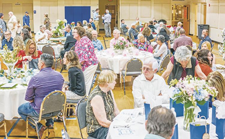 Sam Jokich/Contributing Photographer  The Andrews Chamber of Commerce annual dinner was held June 20 at Andrews United Methodist Church downtown. The fellowship hall was filled with folks celebrating the positive things that happened over the last year.