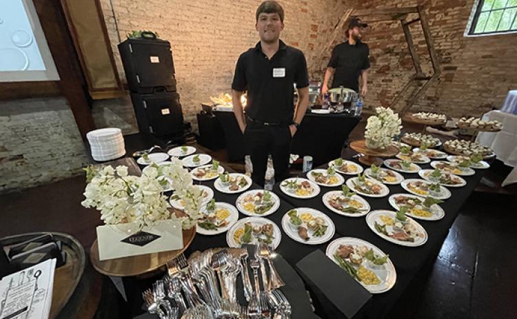 Randy Foster/editor@cherokeescout.com Staff at Legends Steakhouse put out full plates as samples during Forks & Corks in Murphy on June 1.