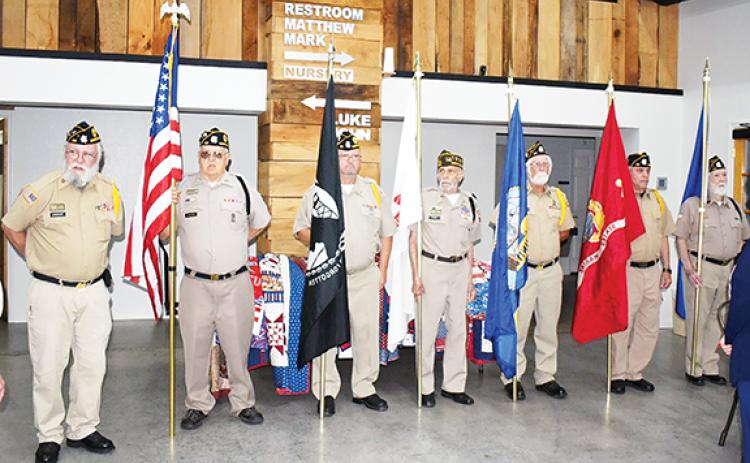 Photos by Anngee Quinones-Belian/Staff Correspondent  The Honor Guard with American Legion Post 96 in Murphy presented the colors on June 12 at Shepherd of the Mountains Church during a luncheon to honor the service of local veterans.