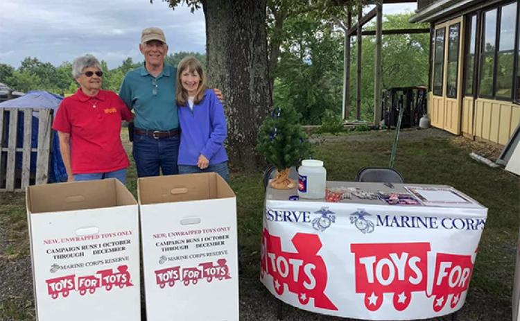 Sarah Thomas/Contributing Photographer Toys for Tots volunteers Gwen Hathaway, Don and Pattie Reynolds enjoy the fundraiser at the Nottely River Valley Vineyards on June 24