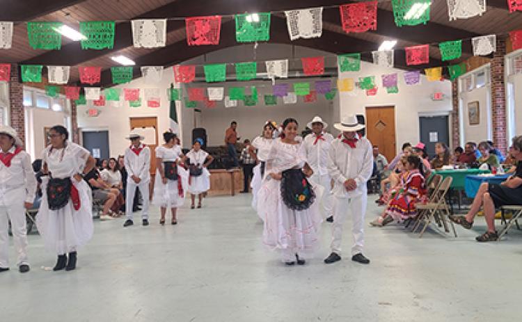 Photos by Nicole Wright/Staff Correspondent Holy Redeemer Catholic Church sponsored Fiesta Latina on Saturday at the Andrews Community Center, celebrating the independence of Mexico and Central America.
