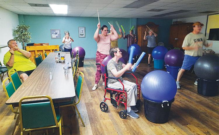 Anngee Quinones-Belian/Staff Correspondent  A new Drumfit class for seniors at Penland Senior Center in downtown Murphy is available three times a week. 