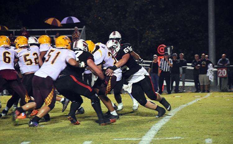 Justin Fitzgerald/sports@cherokeescout.com Andrews Samuel Preston fights for extra yards during the Wildcats’ 21-14 loss to Cherokee on Friday night.