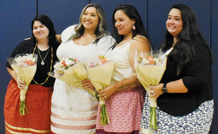 Dadiwonsi Language Program graduates stand in recognition at the end of the ceremony on Sept. 26. From left are Jazlyn “Wadulisi” McEntire, Cailon “Uwodsdi” Garland, Kirstie “Tsayga” Frady and Gina “Amage” Myers.