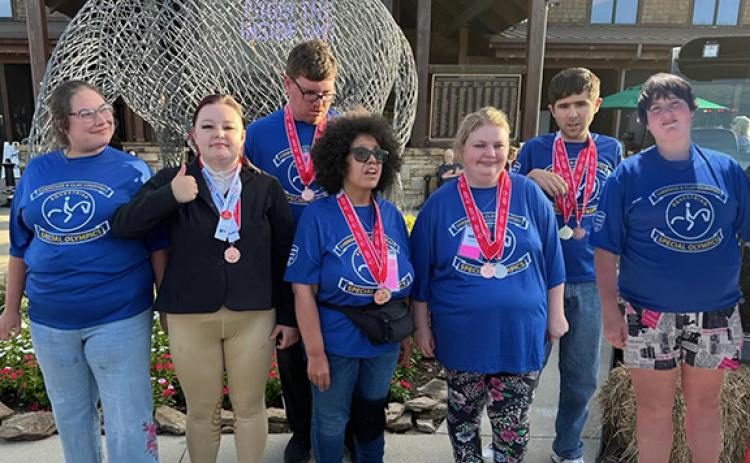 Athletes attending the Special Olympics of N.C. State Equestrian Tournament are (front from left) Liz Jennings, Lana Foster, Keisha Carter, Christina Zimmerer and Marian Carter; (back from left) Josh Mills and Nathan Young.