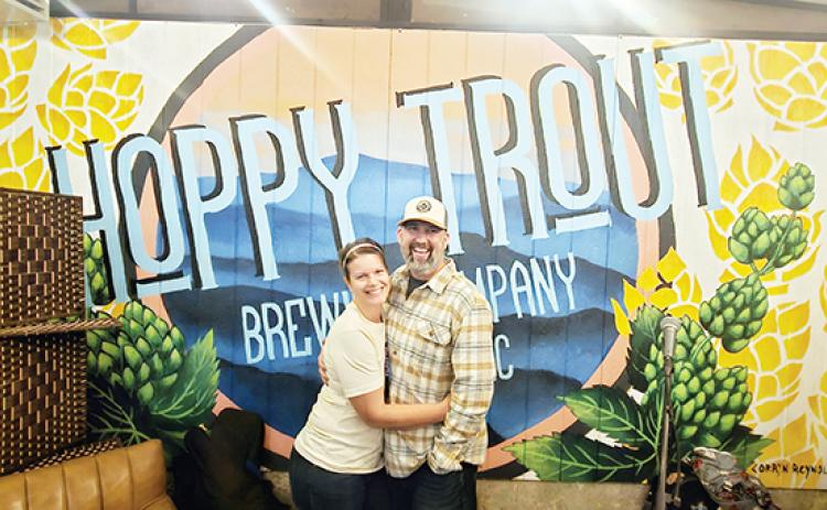 Nicole Wright/Staff Correspondent Kam and Corey Thompson are stoked to be the new owners of Hoppy Trout Brewing Co. on Main Street in downtown Andrews. They have already made positive changes.