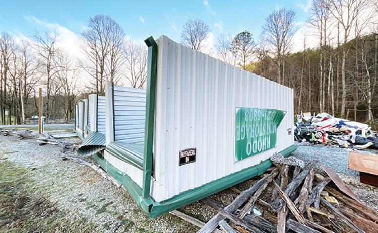 Randy Foster/editor@cherokeescout.com This metal building belonging to Rhodo Mini Storage in the Granny Squirrel area of eastern Cherokee County was toppled by high winds during storms over the weekend.