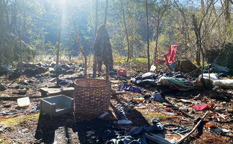 Photos by Randy Foster/editor@cherokeescout.com This homeless camp, located off of a U.S. Forest Service road beside the Hiwassee River near Murphy, seemed abandoned when volunteers went there as part of a “point in time” project to count homeless people living in Cherokee County on Jan. 31.