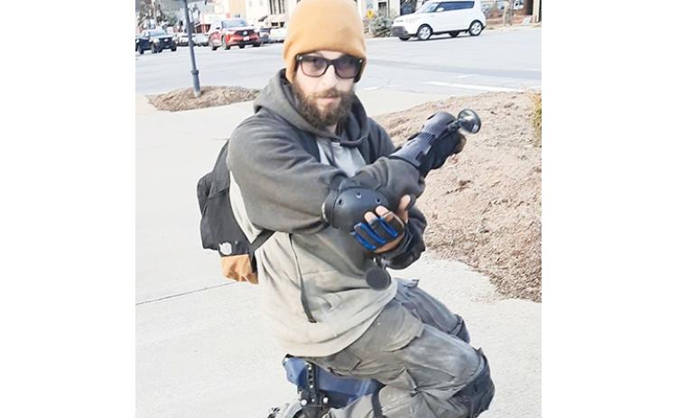 Anngee Quinones-Belian/ Staff Correspondent Matthew Longwell of Hanging Dog enjoys moving about on his electric unicycle, which he claims is street legal.