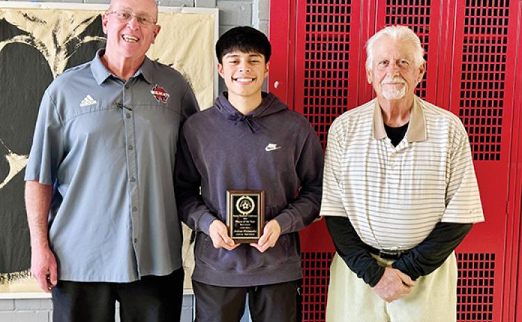 J.R. Carroll/Staff Correspondent From left are Andrews athletic director Frank Maenlee, Smoky Mountain Conference Soccer Player of the Year Joshua Hernandez and Andrews soccer coach Patrick Santon.