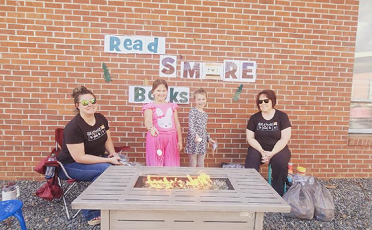 Nicole Wright/Staff Correspondent Students and staff at Andrews Elementary School had a great time with all things reading and s’mores March 7.