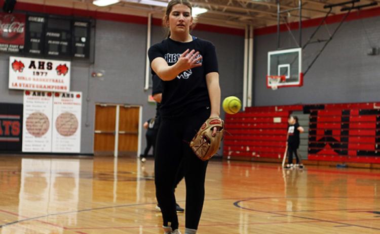 Cannon Crompton/sports@cherokeescout.com Kinleigh Queen working on pitching during an indoor practice on March 6.