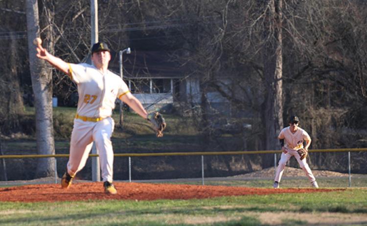 J.R. Carroll/Staff Correspondent Murphy’s Caleb Kephart pitches as Alex Golden looks on during a March 4 game.